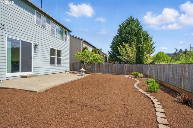 15820 SW Towhee Ln, Beaverton, OR 97007 - fenced backyard featuring a patio area