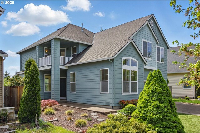 15820 SW Towhee Ln, Beaverton, OR 97007 - rear view of property with roof with shingles and a balcony