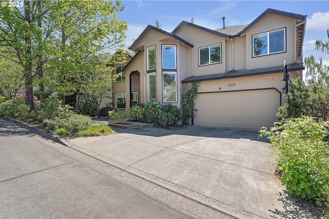 view of front of house featuring a garage and driveway