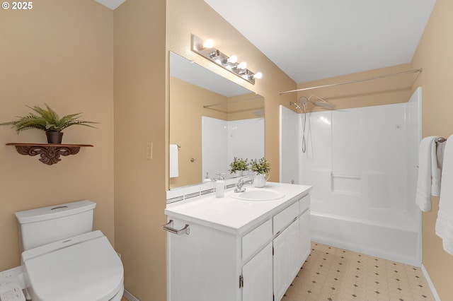 bathroom featuring tile patterned floors, shower / tub combination, toilet, and vanity