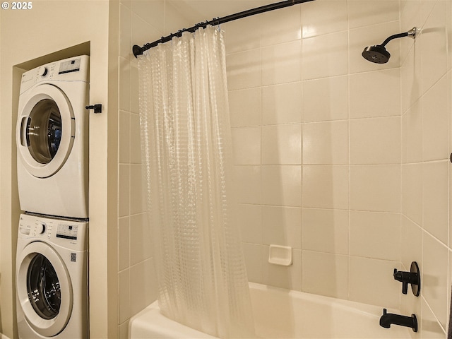 1030 NW 12th Ave Unit 410, Portland, OR 97209 - full bathroom featuring stacked washer and dryer and shower / bath combo