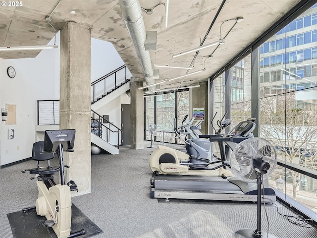 1030 NW 12th Ave Unit 410, Portland, OR 97209 - workout area featuring baseboards and a wall of windows
