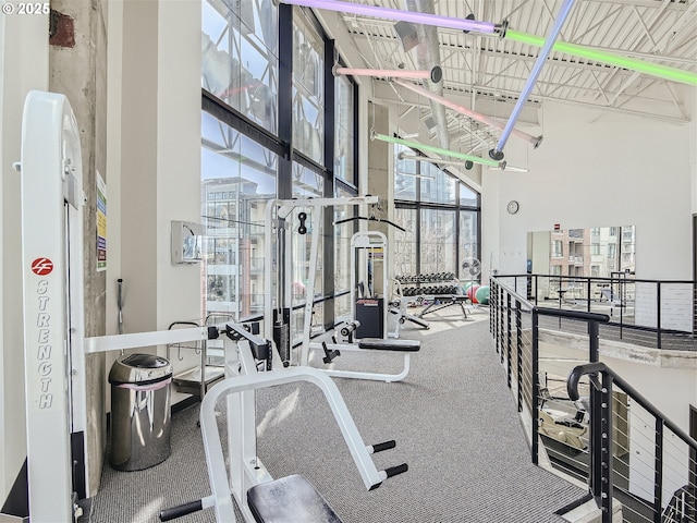 1030 NW 12th Ave Unit 410, Portland, OR 97209 - workout area featuring a towering ceiling and expansive windows