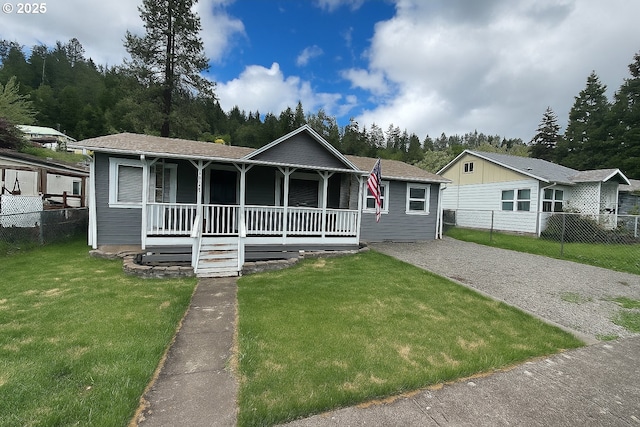 48399 E 1st St, Oakridge, OR 97463 - view of front of house with a porch and driveway