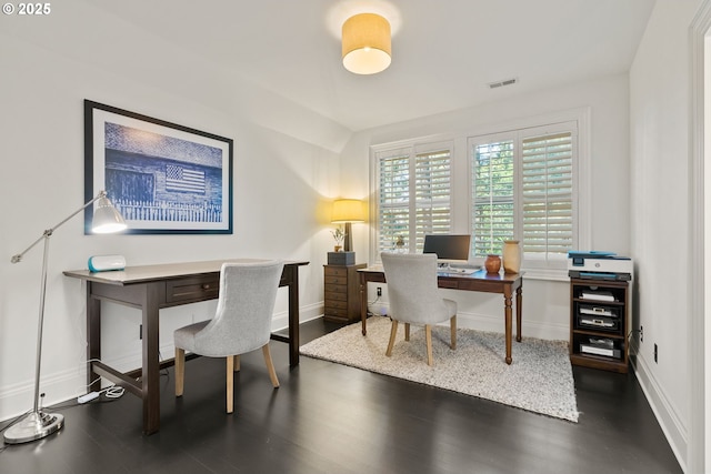 office area with wood finished floors and baseboards