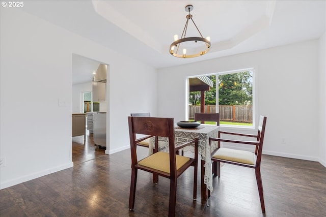 18930 Highland Dr, Oregon City, OR 97045 - dining area with plenty of natural light, a chandelier, dark wood-style floors, and a raised ceiling