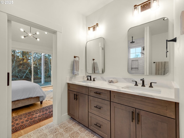 bathroom with vanity and hardwood / wood-style floors