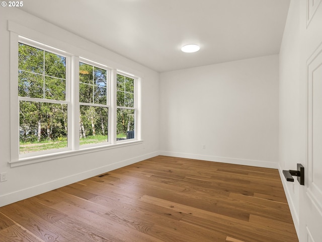 90202 Hobie Rd, Warrenton, OR 97146 - empty room with baseboards and wood finished floors