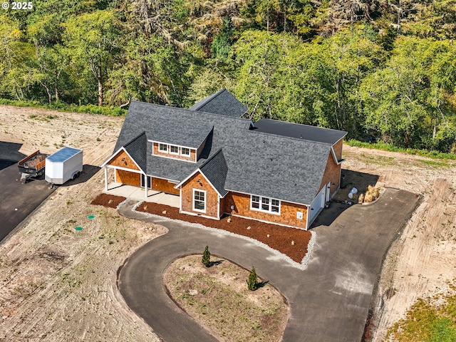 90202 Hobie Rd, Warrenton, OR 97146 - view of subject property with a heavily wooded area
