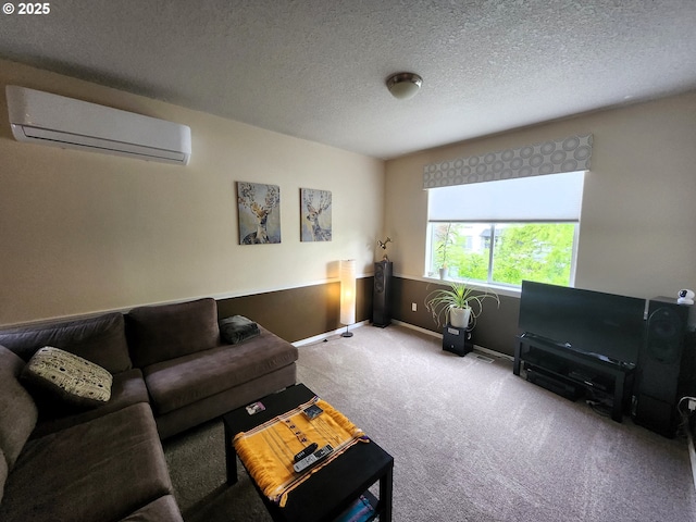 2405 Strasburg Dr, Forest Grove, OR 97116 - carpeted living area featuring an AC wall unit, baseboards, and a textured ceiling