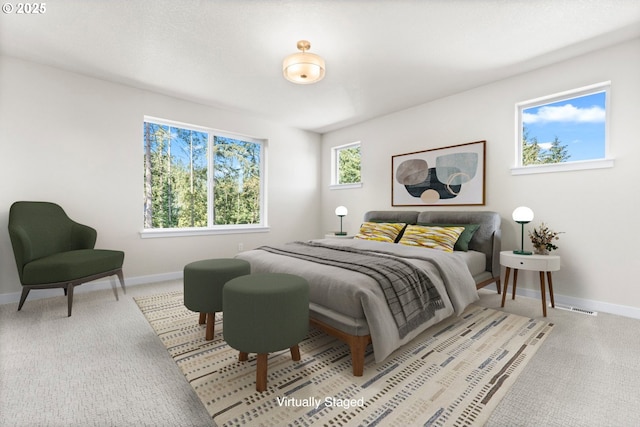 7827 SW Thornbridge Ter Unit 9, Beaverton, OR 97007 - bedroom featuring baseboards and carpet