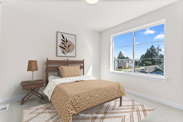 7827 SW Thornbridge Ter Unit 9, Beaverton, OR 97007 - carpeted bedroom featuring baseboards