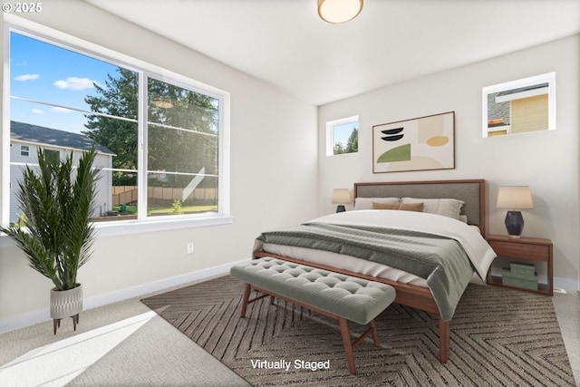 7827 SW Thornbridge Ter Unit 9, Beaverton, OR 97007 - carpeted bedroom featuring baseboards