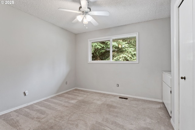 13980 Shireva Ct, Lake Oswego, OR 97034 - unfurnished room with a textured ceiling, a ceiling fan, and carpet flooring