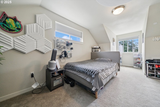 116 NE 109th Ave Unit A5, Portland, OR 97220 - bedroom featuring vaulted ceiling, carpet flooring, and baseboards