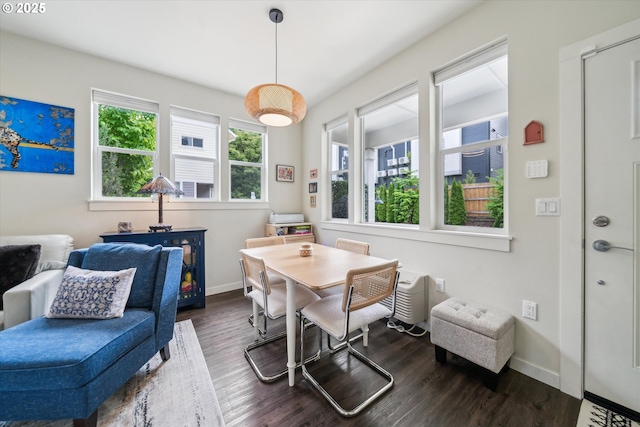 116 NE 109th Ave Unit A5, Portland, OR 97220 - dining area featuring dark wood finished floors and baseboards