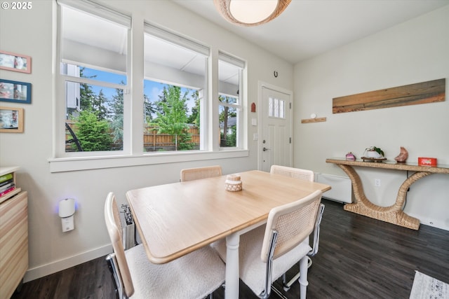 116 NE 109th Ave, Portland, OR 97220 - dining space with healthy amount of natural light, dark wood finished floors, and baseboards