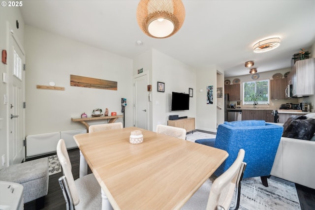 116 NE 109th Ave, Portland, OR 97220 - dining room featuring light wood-style flooring