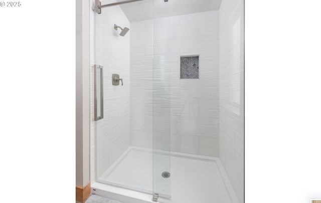 full bathroom featuring a stall shower