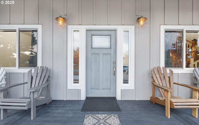 doorway to property with board and batten siding