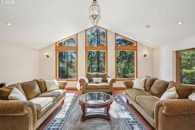 living room featuring baseboards, vaulted ceiling, wood finished floors, and recessed lighting