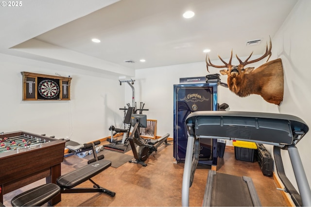 workout room featuring visible vents and recessed lighting