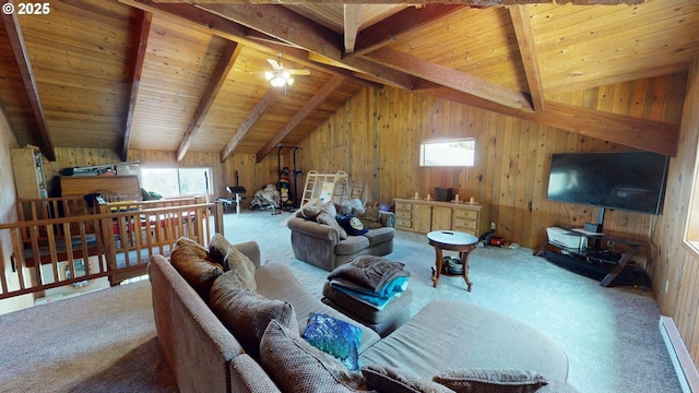 carpeted living room featuring wooden walls, wooden ceiling, lofted ceiling with beams, and a ceiling fan