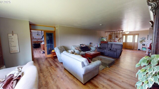 living area with light wood-style flooring