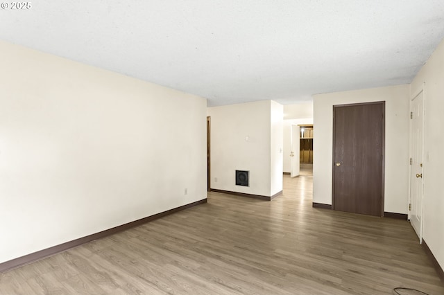 9208 NE 27th St, Vancouver, WA 98662 - empty room featuring wood finished floors and baseboards