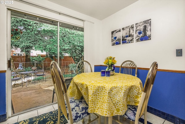 dining space featuring tile patterned floors
