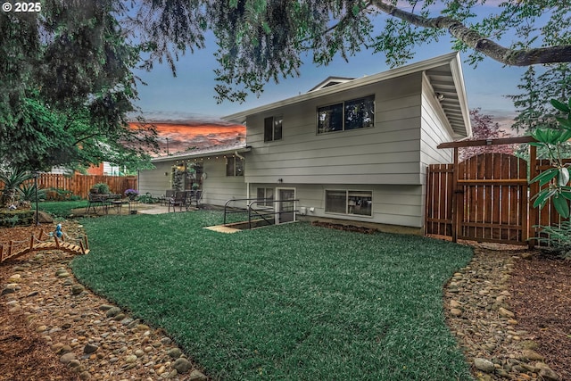 rear view of house featuring a patio