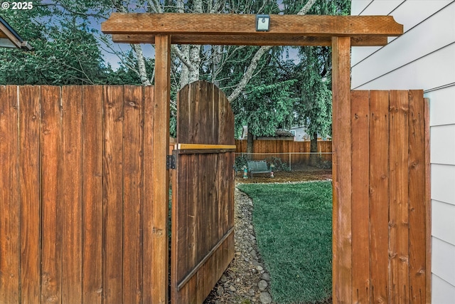 view of yard featuring a gate and fence