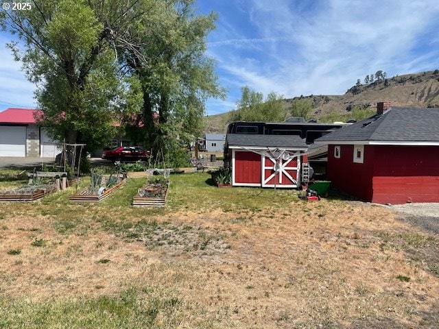501 Clairmont St, Wallowa, OR 97885 - view of grassy yard with a garden