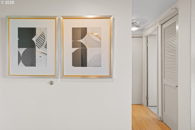 corridor with wood finished floors