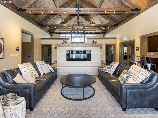 14215 SW Burlwood Ln, Beaverton, OR 97005 - living room featuring beamed ceiling, an inviting chandelier, high vaulted ceiling, track lighting, and wooden ceiling