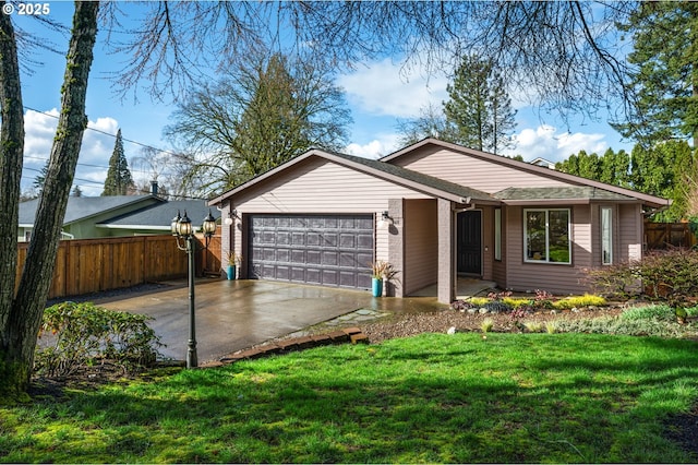 ranch-style house featuring a front lawn, concrete driveway, an attached garage, and fence