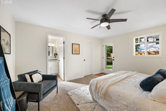 carpeted bedroom featuring connected bathroom, baseboards, a ceiling fan, and access to outside