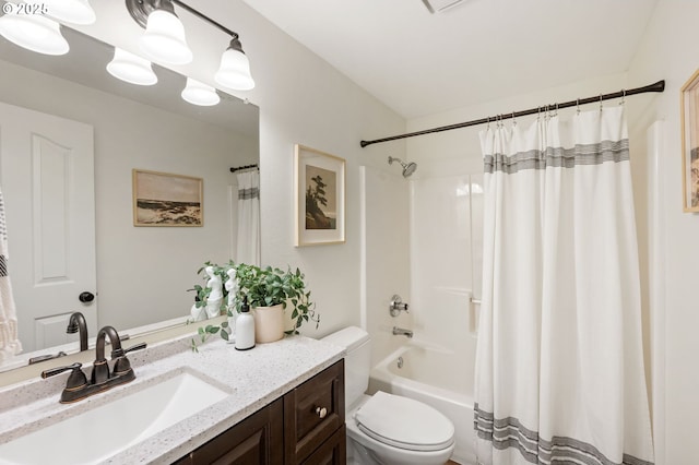 full bathroom featuring vanity, toilet, and shower / bath combo