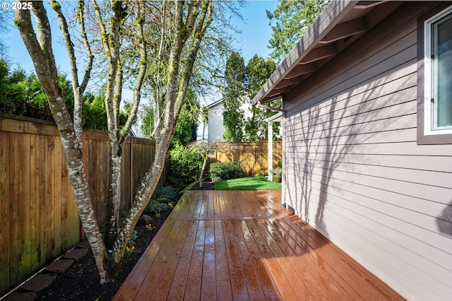 wooden deck featuring fence