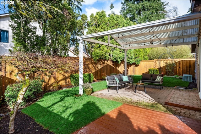 view of yard with an outdoor hangout area, a pergola, a fenced backyard, and a patio