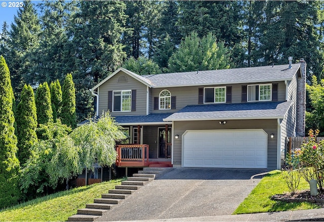 2111 NE 149th Ave, Vancouver, WA 98684 - traditional-style house with asphalt driveway, covered porch, and stairway