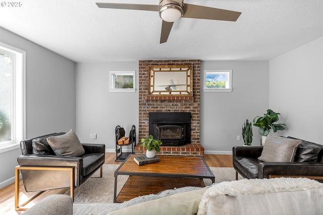 2111 NE 149th Ave, Vancouver, WA 98684 - living area with a textured ceiling, wood finished floors, a ceiling fan, and baseboards