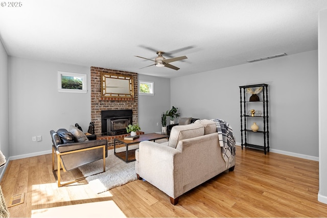 2111 NE 149th Ave, Vancouver, WA 98684 - living area with light wood-style floors, ceiling fan, healthy amount of natural light, and baseboards