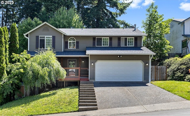 2111 NE 149th Ave, Vancouver, WA 98684 - traditional-style house with a garage, driveway, covered porch, stairs, and a shingled roof