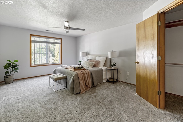 2111 NE 149th Ave, Vancouver, WA 98684 - carpeted bedroom with a ceiling fan, a textured ceiling, and baseboards