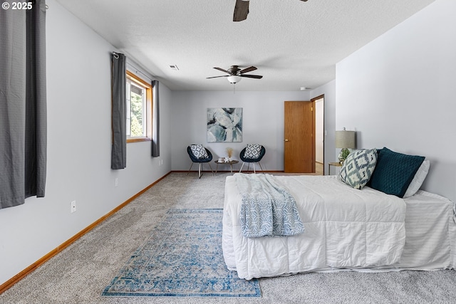 2111 NE 149th Ave, Vancouver, WA 98684 - bedroom featuring carpet, baseboards, a textured ceiling, and ceiling fan