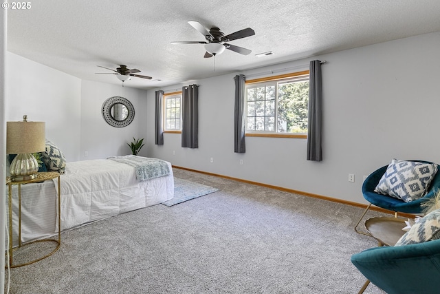2111 NE 149th Ave, Vancouver, WA 98684 - bedroom featuring carpet flooring, a textured ceiling, baseboards, and ceiling fan