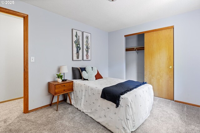 2111 NE 149th Ave, Vancouver, WA 98684 - bedroom featuring light carpet, a closet, and baseboards