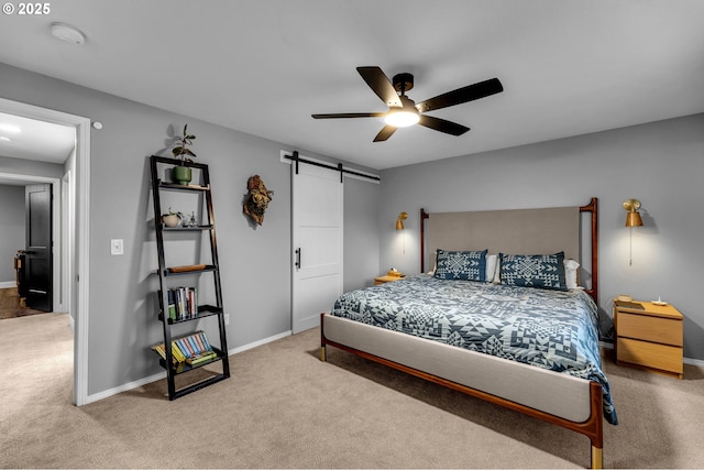 10417 NE 86th Ave, Vancouver, WA 98662 - bedroom featuring carpet flooring, a barn door, and a ceiling fan