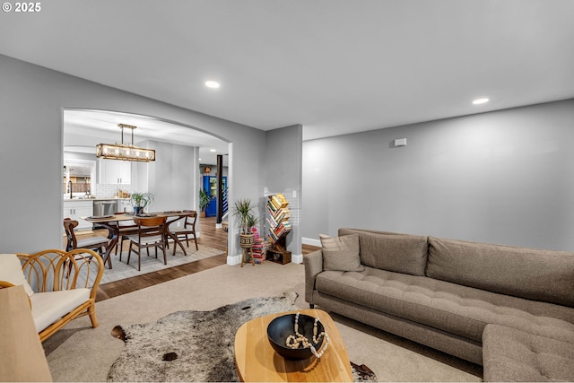 10417 NE 86th Ave, Vancouver, WA 98662 - living room with recessed lighting, arched walkways, and wood finished floors